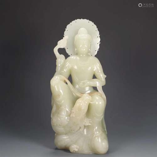 A Hetian Jade Figure Of Guanyin Seated On A Dragon