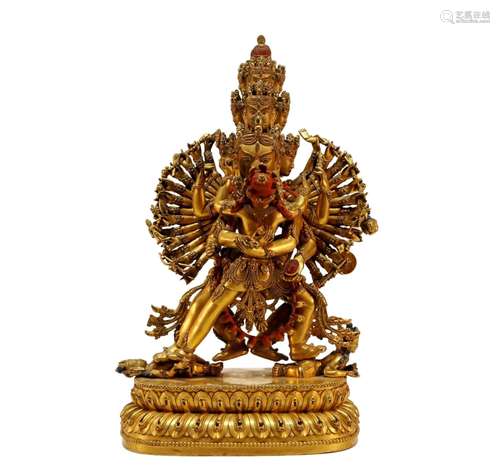 A fine Tibetan gilt bronze money god statue