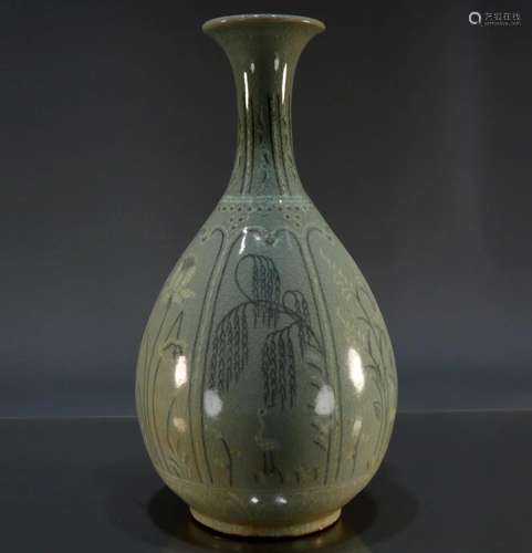 A Korean Celadon-Glazed Floral 'Willow' Bottle Vas...