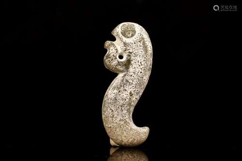 A Hongshan Culture Jade 'Fish' Pendant.