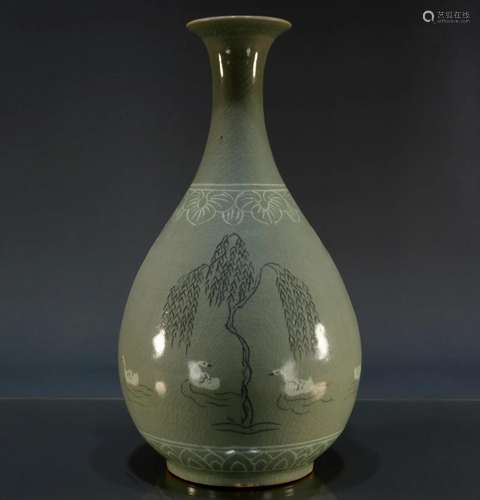 A Fine Korean Celadon-Glazed Floral Bottle Vase