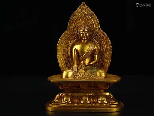 A Gilt-Bronze Figure Of Buddha