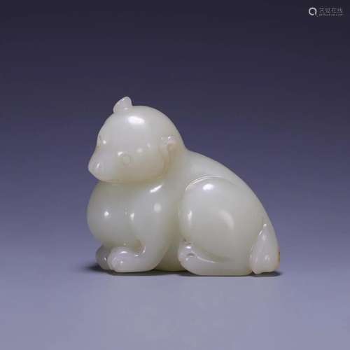 A Hetian Jade 'Auspicious Beast' Paperweight