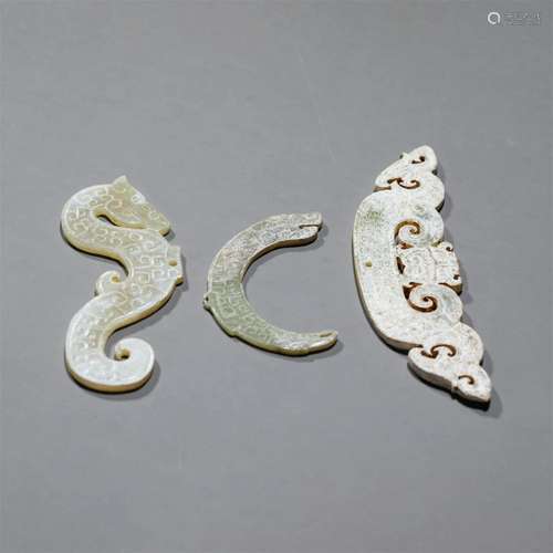 Set of Three Carved Jade Dragon Ornaments