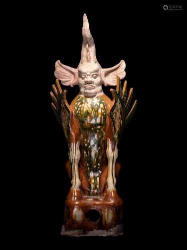 A Chinese Sancai Glazed Pottery Figure of an Earth Spirit, Z...