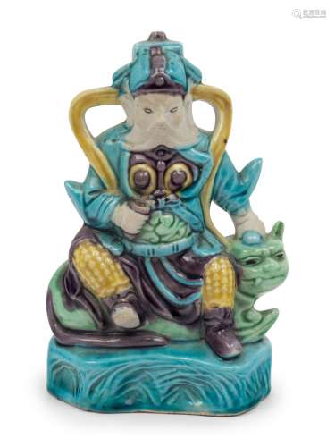 A Chinese Sancai Glazed Porcelain Figure