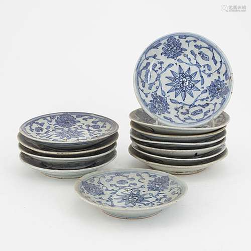 A set of 12 similar Chinese blue and white porcelain small d...