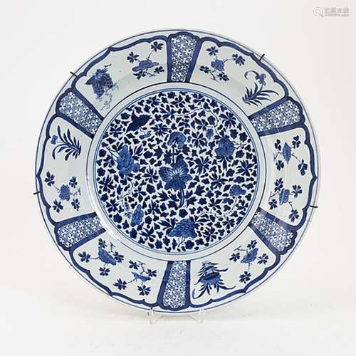 A Chinese blue and white Kangxi-style dish, 19th century.