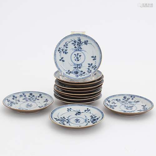 A group of 12 blue and white and capuciner glazed dishes, Qi...