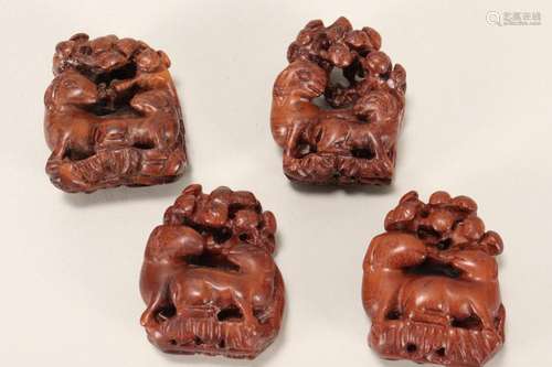 Four Japanese Wooden Netsuke,