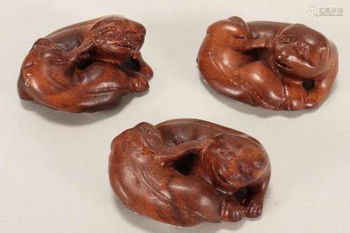 Three Japanese Carved Wooden Netsuke,