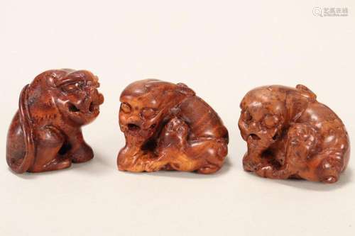 Three Japanese Carved Wooden Netsuke,