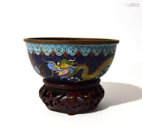 A Chinese Cloisonne Dragon Bowl on a Fitted Wooden Stand