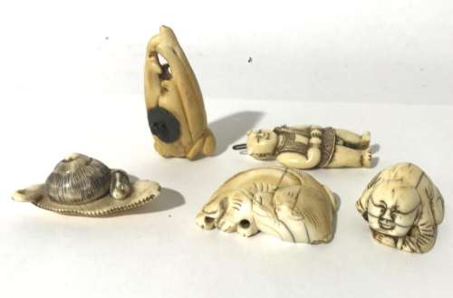 A Collection of Four Japanese Netsuke, 20th Century comprisi...