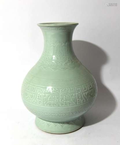 A Chinese Celadon Douqing Vase with Archaistic Pattern, Qian...