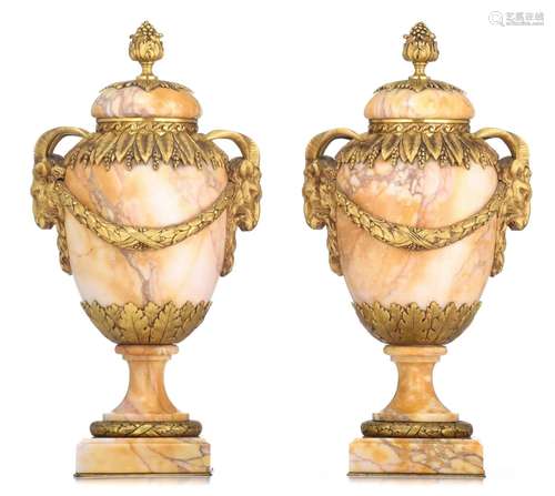 (T) A fine pair of Neoclassical marble cassolettes, H