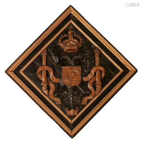 (T) A carved hatchment ('Obiit') with the coat of ...