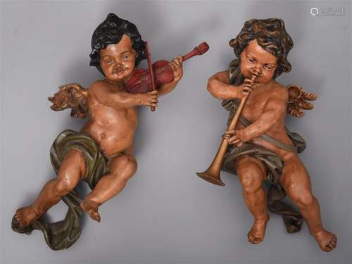 (T) A pair of decorative music playing angels, 20thC,