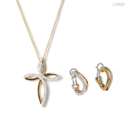 (T) An 18ct white and yellow gold pendant with chain,