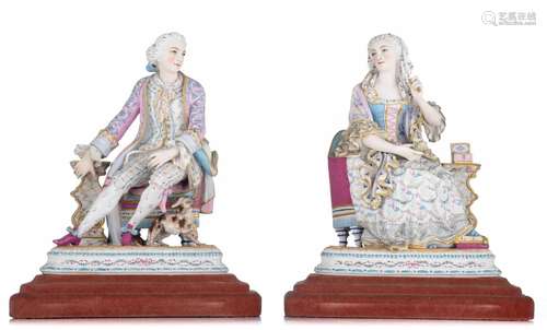 (T) A pair of biscuit figurines of a gallant couple in