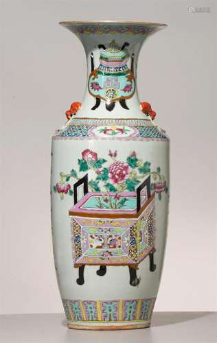 (T) A Chinese famille rose vase, paired with Fu lion