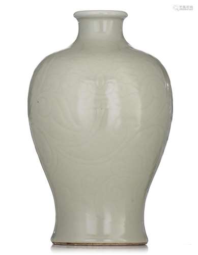 (T) A Chinese carved celadon-glazed vase, late