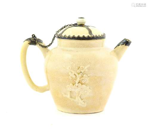^ A Chinese White Metal Mounted Blanc de Chine Teapot and Co...