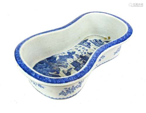 A Chinese Porcelain Bidet, Jiaqing, of waisted oval form, pa...