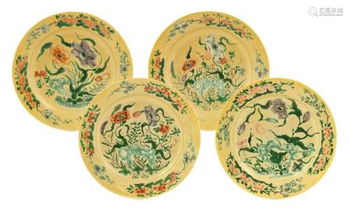 ^ A Set of Four Chinese Porcelain Plates, Kangxi, painted in...
