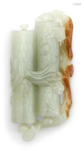 A Chinese Celadon and Russet Jade Carving