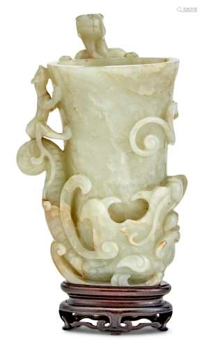 A Fine Chinese Carved Celadon Jade Rhyton Cup