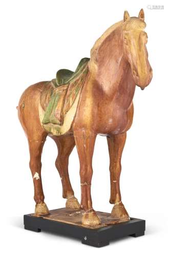 A Chinese Sancai Glazed Pottery Figure of a Horse