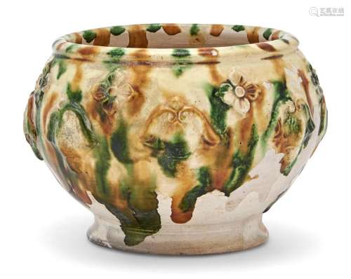 A Chinese Molded Sancai Pottery Jar with Florets