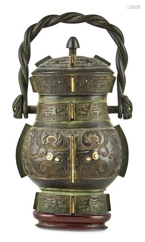 A Chinese Parcel Gilt Bronze Archaistic Vase and Cover