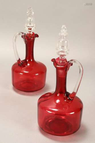 Pair of Edwardian Ruby Glass Decanters & stoppers,