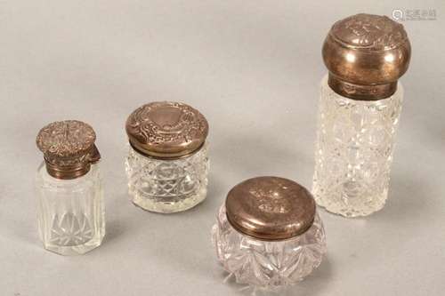 Four Silver Top Glass Toiletry Jars,