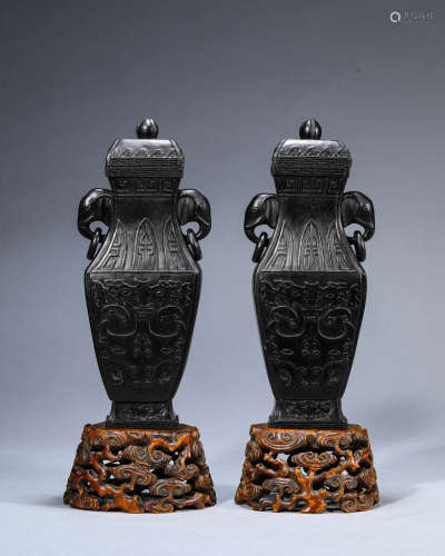 A Pair of Chinese Zitan Taotie Mask Vases and Covers
