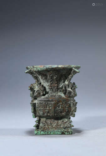 A Chinese Bronze Taotie Vase Zun