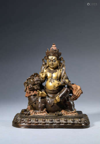 A Chinese Brushed Gold Yellow Jambhala Staute