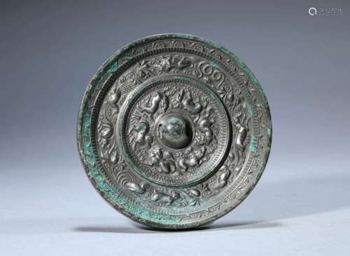 A Chinese Bronze Beast Mirror