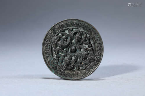 A Chinese Bronze Dragon Mirror