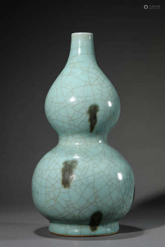 A Chinese Porcelain Celadon-Glazed Double-Gourd Vase
