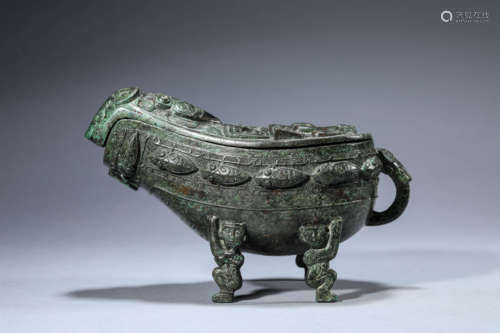 A Chinese Bronze Wine Vessel and Cover