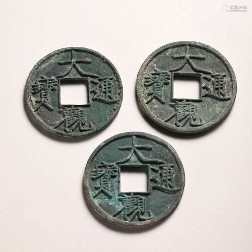 A SET OF CHINESE TANG DYNASTY BRONZE COINS