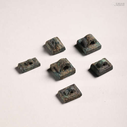 A SET OF BRONZE SEALS FROM THE WARRING STATES PERIOD OF CHIN...