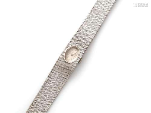 53. Bracelet montre de dame en or gris (750/1000e). Mouvemen...