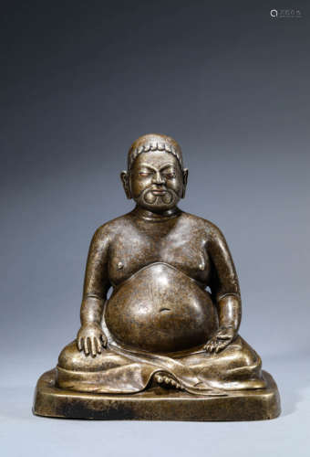 A Chinese Bronze Guru Statue