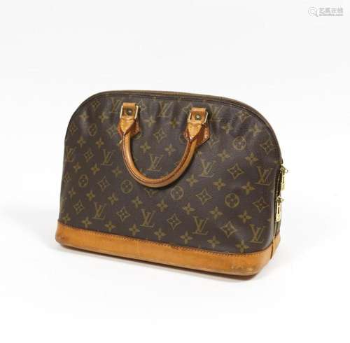 LOUIS VUITTON -Sac à main Alma - En toile monogramme et cuir...