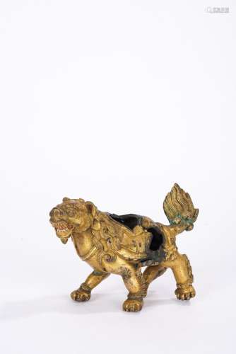 A Chinese gilt bronze auspicious beast, Ming Dynasty