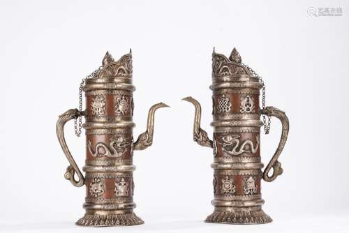 Tibetan Pair of copper inlaid silver mdong-mo pots